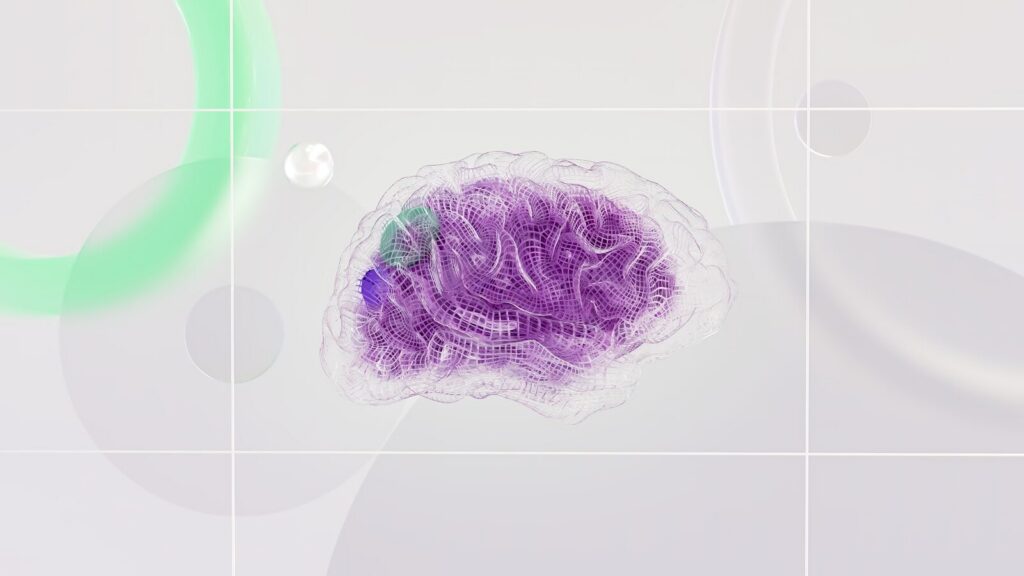 A wireframe human brain with purple and green highlights on a light background